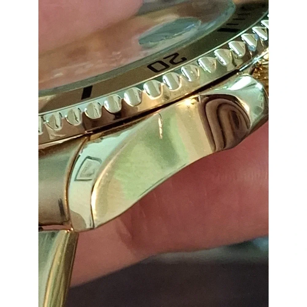 OLEVS 5885G 43mm Polished Goldtone Mens Watch,Day Indicator,Quartz Movement.